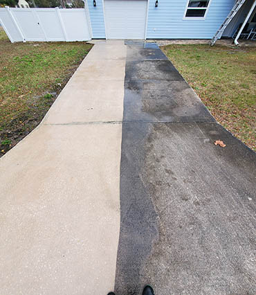 driveway side by side before pressure washing with surface cleaner