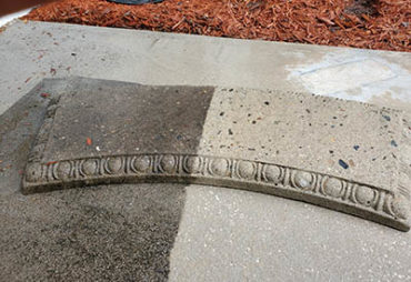 side by side of pressure washing before and after